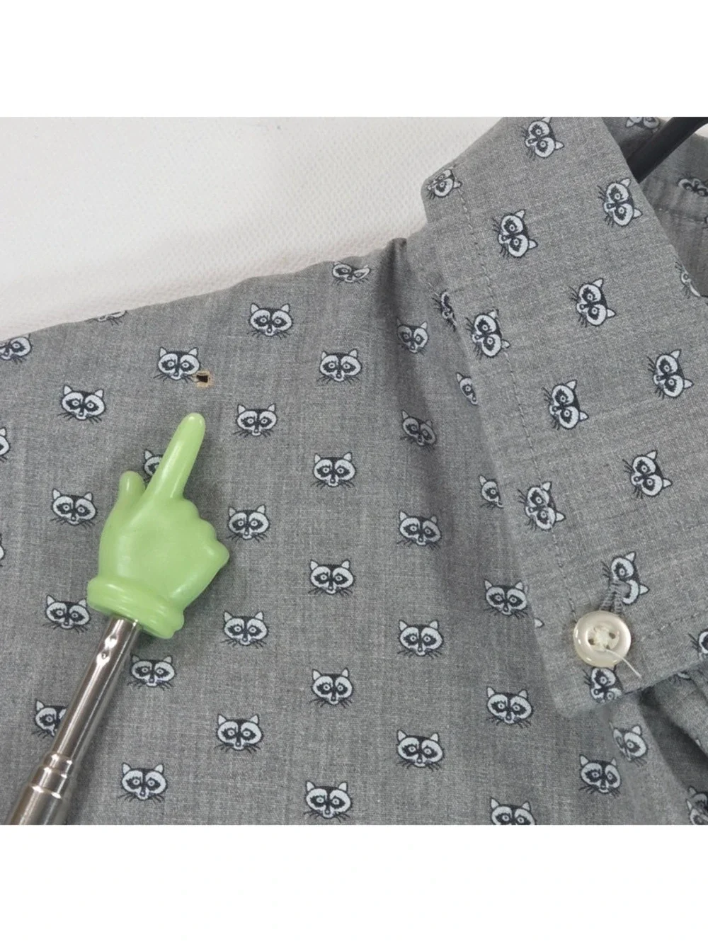Banana Republic all-over grey raccoon face print.